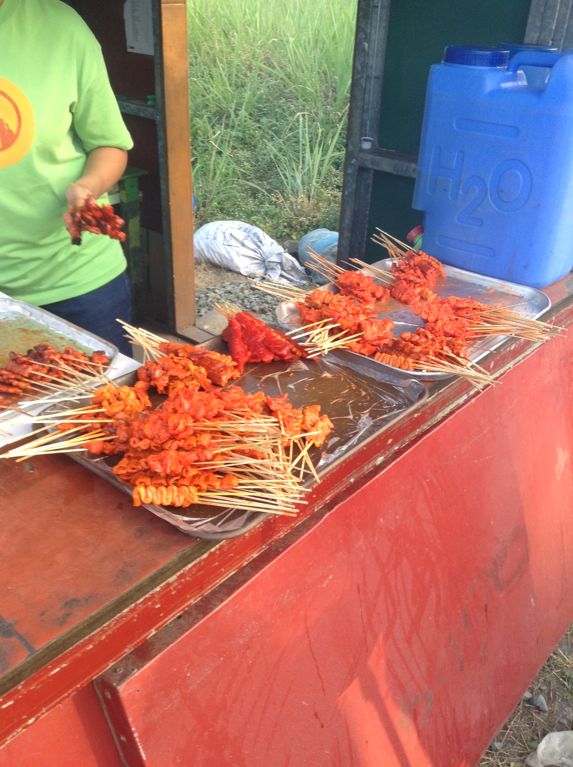 Filipino comfort food - Isaw Manok, grilled chicken intestines